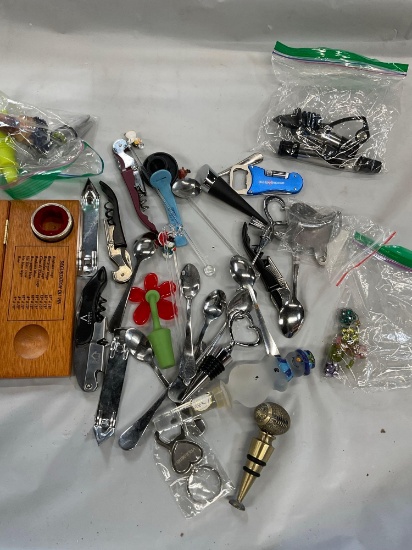 Grouping of assorted wine openers, spoons, wine toppers, etc. Over 30 pieces