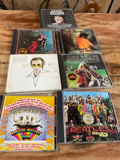 Music Cd's, Beatles, Elton John, Bruce Springsteen, Kenny Rogers, Janis Joplin. 7 pieces