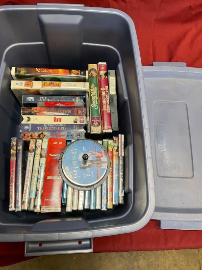 DVDs , VHS & CDs. Over 30 pieces includes Rubbermaid container