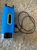 Scosche boom bottle with charger cable, has broken pedestal, works.