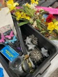 Grouping of artificial flowers, plastic swords, goodie bags, etc