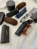 Grouping of assorted glass cases and glasses. 13 pieces