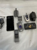 Grouping of assorted, Cell phones, & cases etc. 9 pieces