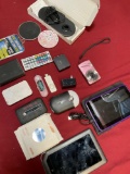 Assorted items. Tablets, chargers, MP3 player,Kodak camera, etc. 17 pieces
