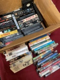 Assorted VHS & DVDs. 46 pieces