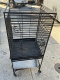 Large rolling bird cage.
