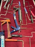 Assorted roller handles & caulk guns. 15 pieces
