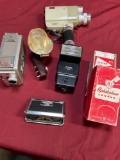 Vintage items. Lenses, Vivitar Thyrister, midget flash holder, Kodak & Minolta 8 mm cameras, Green