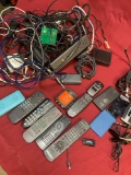 Assorted cords, chargers, remotes, etc. Over 25 pieces