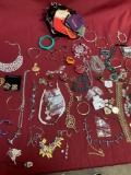Assorted custom jewelry, and jewelry bags.77 pieces
