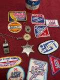 Assorted badges, Sheriff star, stamped Military whistle, key chain, pendant, piggy bank. 15 pieces
