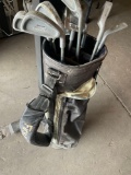 First Flight golf bag and 11 assorted golf clubs