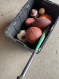 Assorted balls & bat. 12 pieces. Tub not included