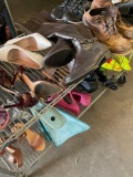 Assorted size and style of shoes. Nike, high heels, Bogs, etc. 20 pairs