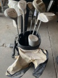 Golf bad and 8 assorted golf clubs