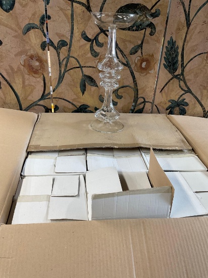 New. 13 1/2", glass candle holders individually packed. 9 pieces