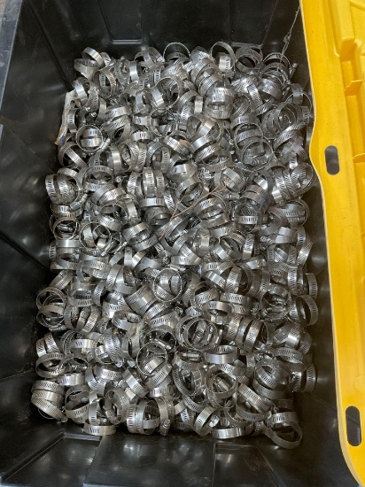 Thousands of hose clamps, includes tub with lid