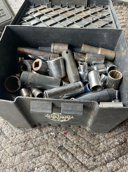 Plastic box and over 40 sockets