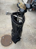 Knight golf bag and 12 assorted golf clubs