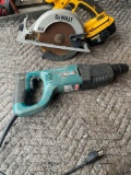 Makita 2455 tool turned on and untested Dewalt saw with battery no charger