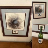Joe Garcia framed prints and empty wine bottle. 23