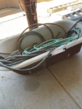 Iron bath tub, assorted hoses, etc