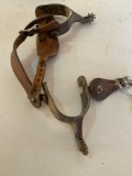 Spurs, steel with leather straps. 1 pair