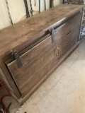 Rustic wood storage cabinet, three drawers with roller door. 31