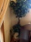 Approximately 9' artificial tree in basket & wood table/ stand