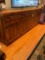 Rustic, four drawer, three door, wood cabinet. 40