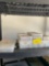 Lot of assorted screws, bolts in storage containers. 6 containers
