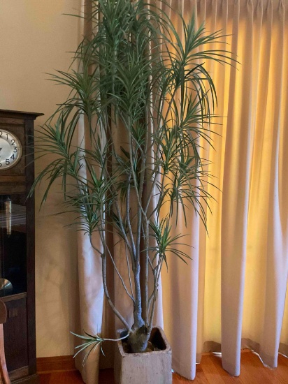 Approximately 10' tall faux decorative tree with planter