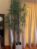 Approximately 10' tall faux decorative tree with planter