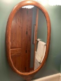 Oval wood frame mirror. 16