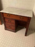 Vintage wood frame, three drawer, marble top desk.28