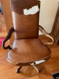 Leather office chair , wood base and arm rests, rawhide accents