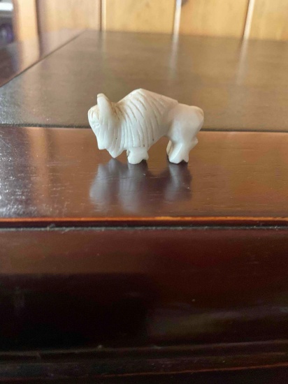 Zuni Fetish Buffalo with turquoise eyes. 1/2" x 1"