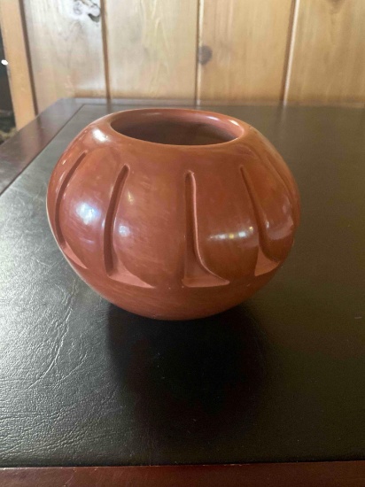 Santa Clara deep carved pottery signed by artist. 4" x 5"