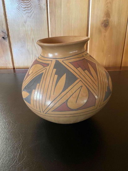 Vintage signed Benito M pottery vase. 7" x 7"