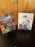 A Century Of Country hardcover book & Buckaroo Vision and Voices of the American Cowboy. 2 pieces