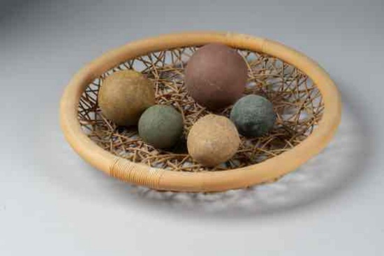 Art Deco. 17" basket, 5 assorted size rocks