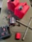 Two gallon gasoline containers, power converter, wrench, inverter, inflator. 6 pieces
