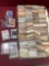 Thousands of collectable cards. Majority are baseball. Some are bent, damaged. Attend preview for