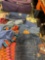 TPRC rolling luggage and assorted clothing. 17 pieces