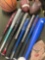 Assorted bats, balls, Renegade left handed baseball glove. 12 pieces