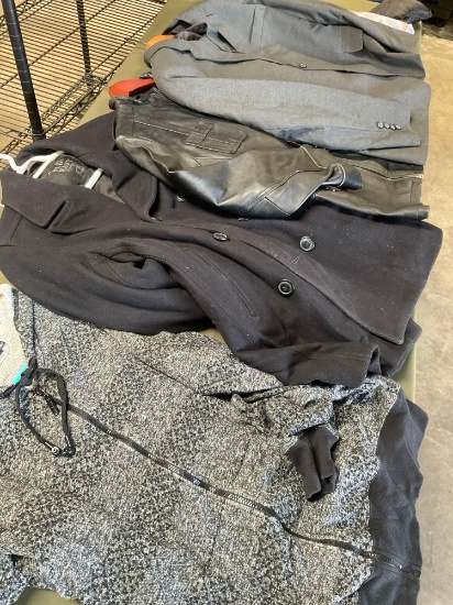 Large lot of clothing. Jackets, coat, suit, blouses, dresses, etc