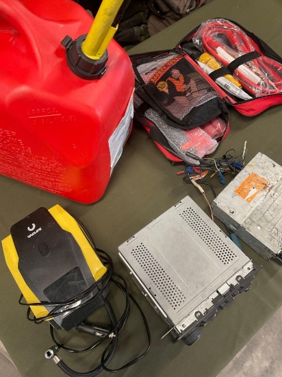 5 gallon gasoline container, car radios, Vaclife tire inflator , Orion first aid supplies. 5 pieces