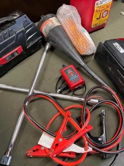 1 gallon gasoline container, compact charger, jumper cables, light, etc. 8 pieces