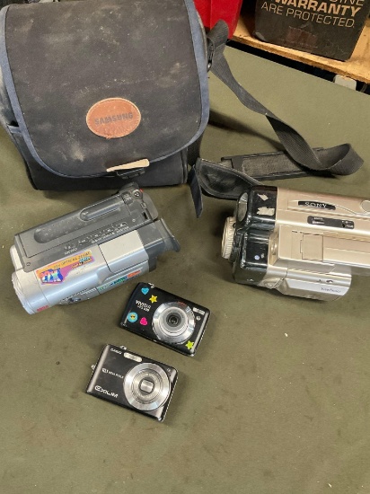 Untested no cords. Sony & Samsung video cameras & bag, Vivitar & Casio cameras. 4 pieces