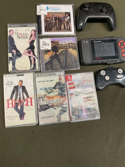 Untested. PS2 games, CDs, controller, etc. 9 pieces